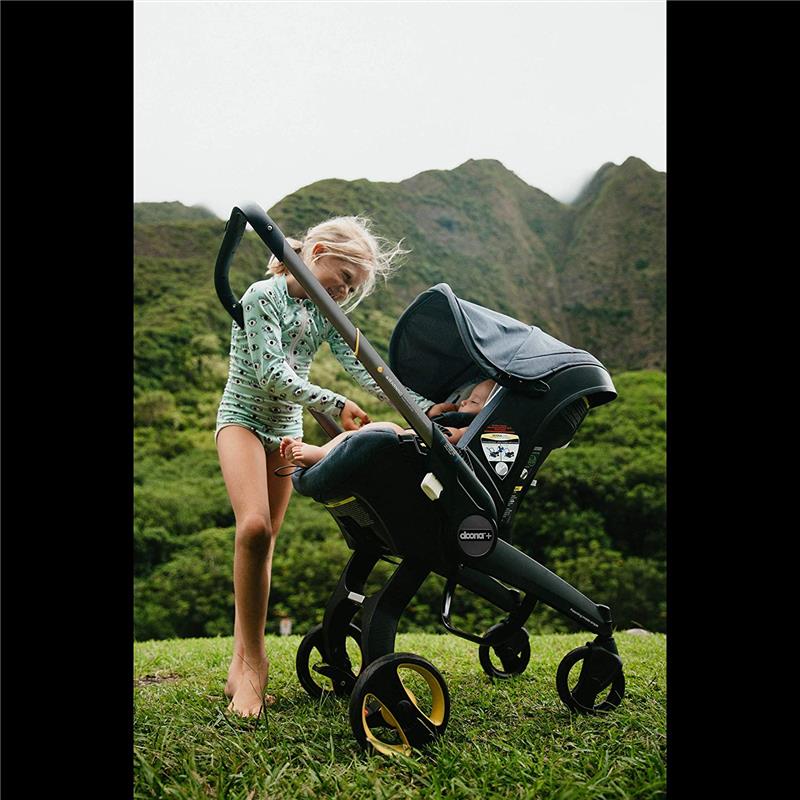 Doona - Siège auto pour bébé avec base et poussette, vert anglais 